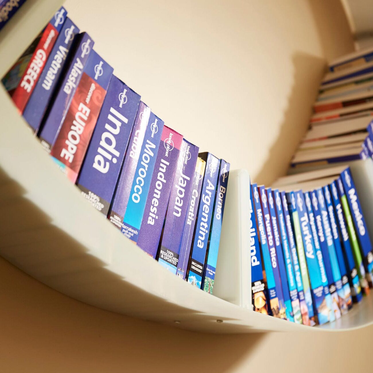 Lonely planet guides on bookshelf